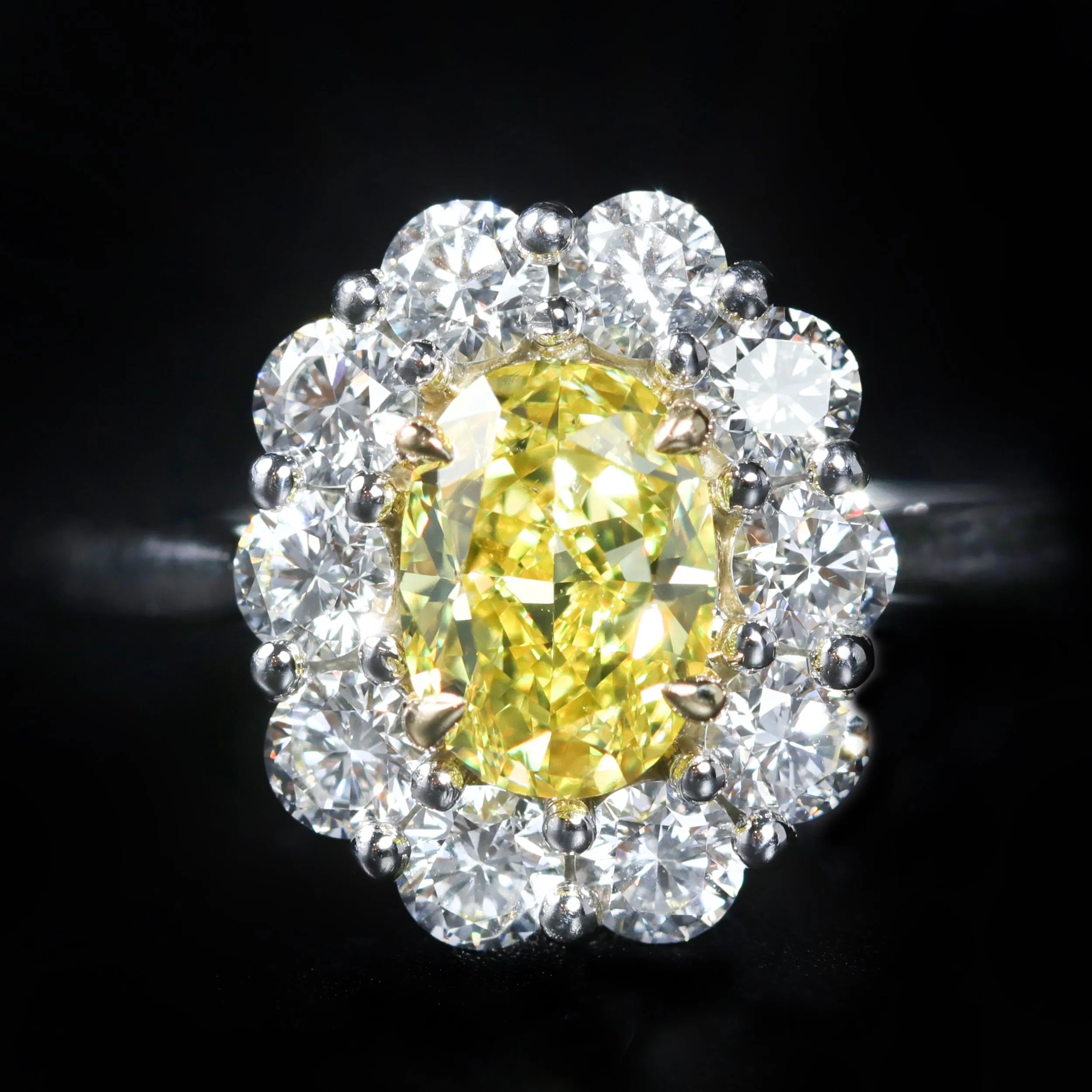Platinum GIA 0.93 Carat Fancy Vivid Yellow Diamond Ring